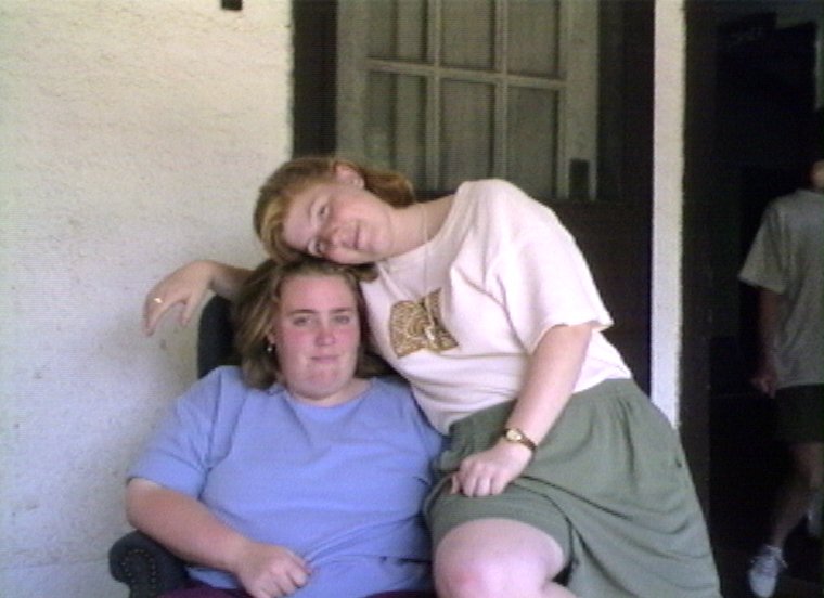 Plyc037.jpg - Molly Garner and Meg Steele relaxing on the front porch of Alford Logde.