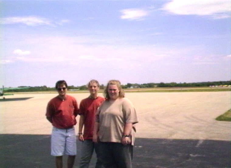 Plyc078.jpg - Steve ”Snuffy” Smith, Carrie Gasser and Molly Garner at the airfield.