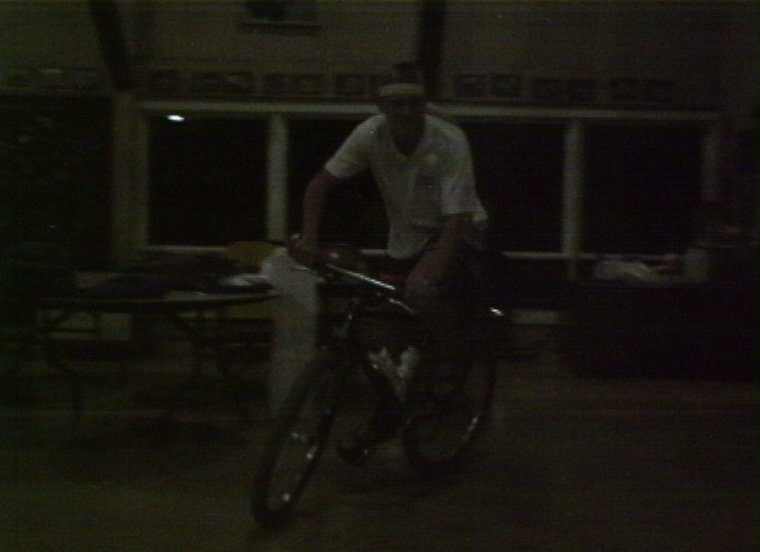 Plyc105.jpg - Staffparty in the Dinning Hall. Jon Orum on a bike.