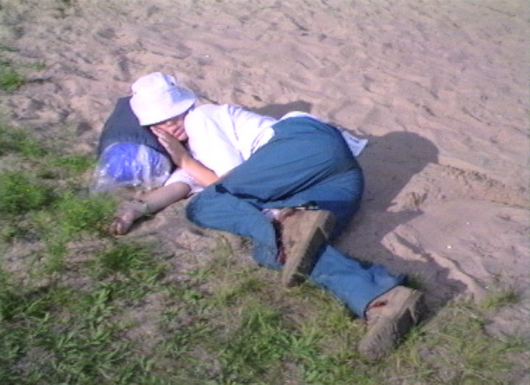 Plyc244.jpg - Canoe trip in the Sylvania Wilderness in Michigan. Nicole Dehne taking a nap before dinner.